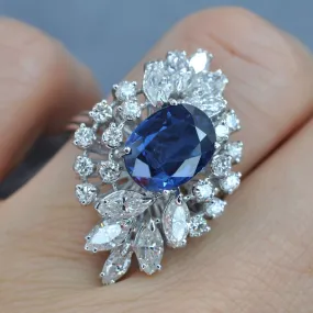 Certified 6.30CT Oval, Round, and Marquise Cut Diamond and Blue Sapphire Engagement Ring in 18KT White Gold