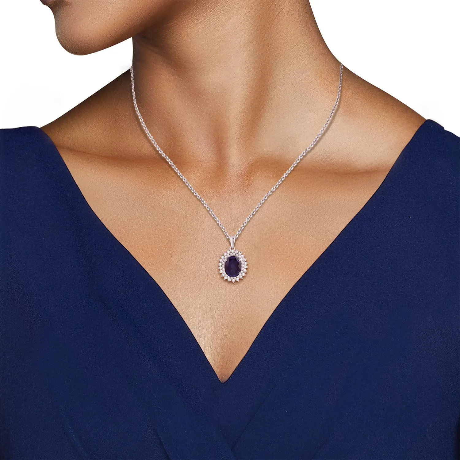 Jewelili Sterling Silver 10x8 MM Oval Created Blue Sapphire and Round Created White Sapphire Halo Pendant Necklace