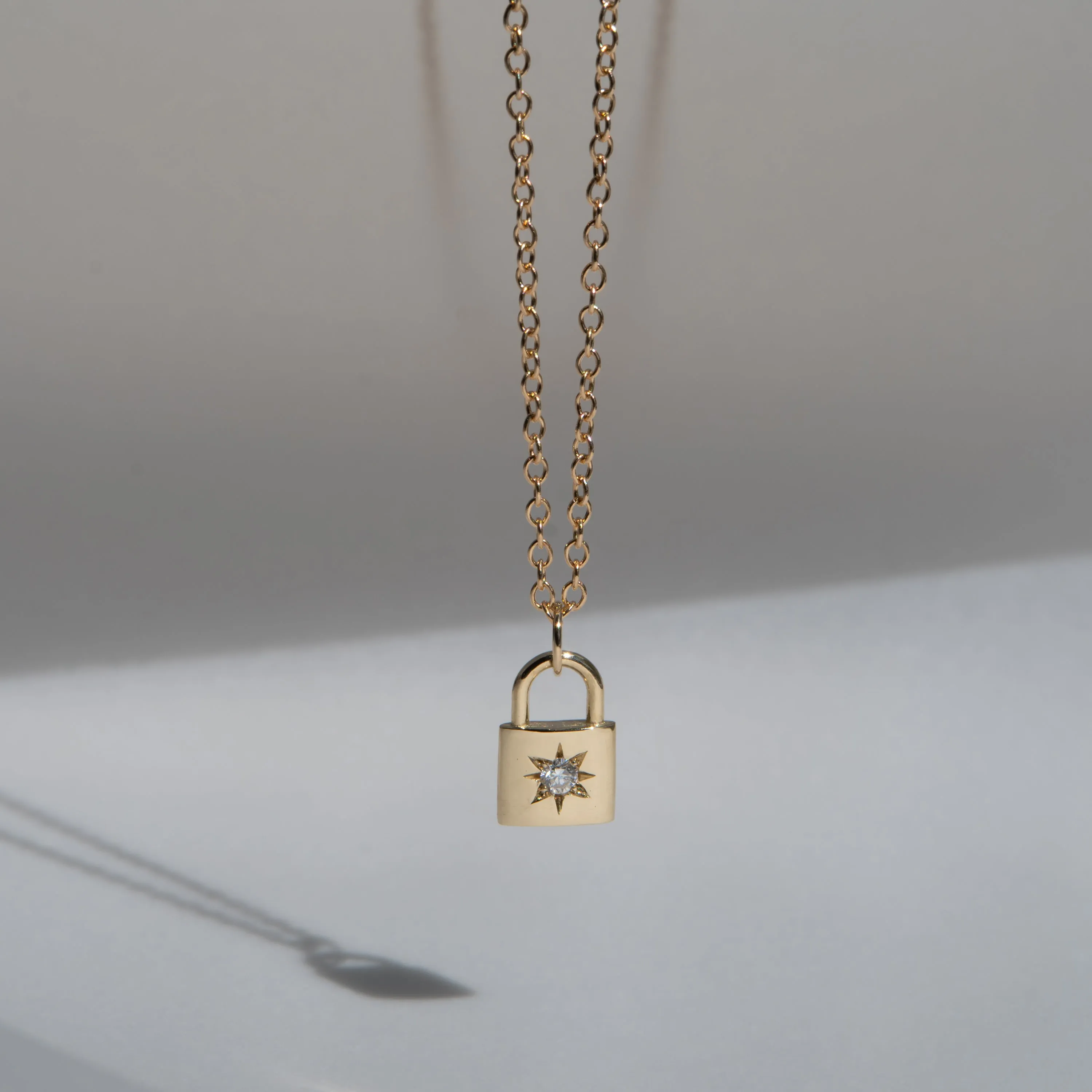 North star padlock necklace, 14k yellow gold