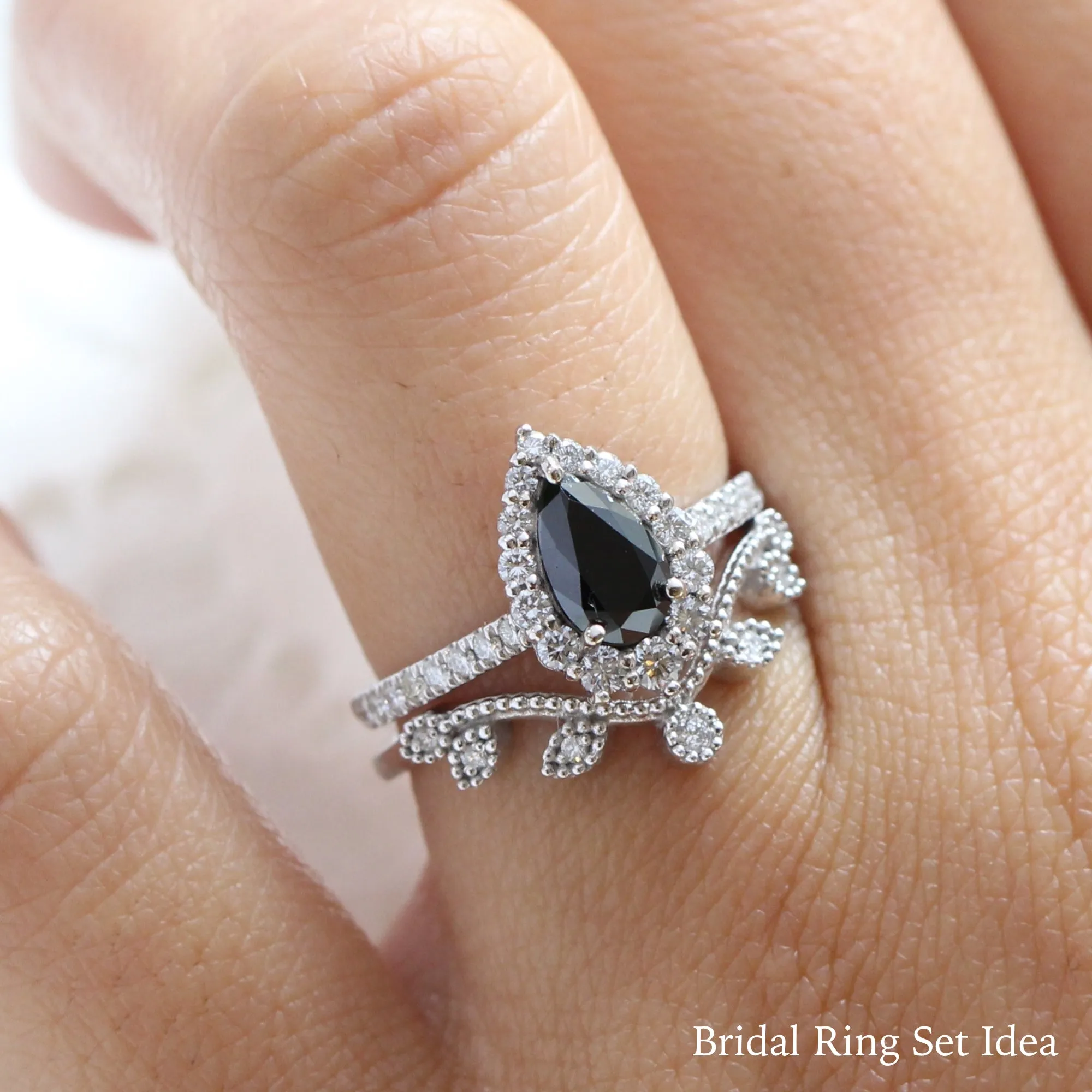 Pear Black Diamond Engagement Ring in Tiara Halo Diamond Pave Band